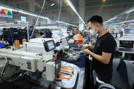 Предприятие по производству комплектующих для швейной продукции в промышленной зоне Камкхе, провинция Футхо. (Фото: ВИА)