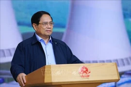 Премьер-министр Фам Минь Тьинь, руководитель Руководящего комитета по строительству АЭС, председательствует на третьем заседании Комитета. (Фото: ВИА).