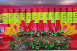 Выпуск фотоальбомов в честь XIV Всевьетнамского партийного съезда