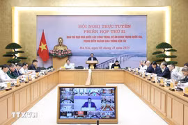Премьер-министр Фам Минь Тьинь председательствует на 21-м заседании Руководящего комитета по реализации национальных приоритетных проектов. (Фото: ВИА).