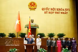 Президент Социалистической Республики Вьетнам То Лам приносит присягу при вступлении в должность. (Фото: ВИА)