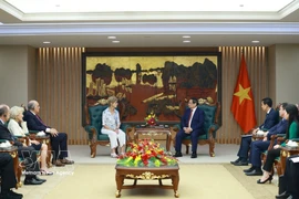 Премьер-министр Фам Минь Тьинь принял делегацию Фонда Эйзенхауэра США. (Фото: ВИА)