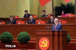 Генеральный секретарь То Лам представляет Доклад ЦК КПВ XIII созыва о документах, выносимых на XIV съезд(Фото: ВИА)