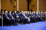 Премьер-министр Фам Минь Тьинь и делегаты присутствуют на открытии 16-го ежегодного совещания новых мировых лидеров ВЭФ (Фото: ВИА)