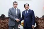 Вице-премьер Хо Куок Зунг принимает губернатора Пермского края РФ (Фото: chinhphu.vn)