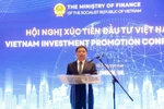 Министр Нгуен Ван Тханг выступает на конференции
