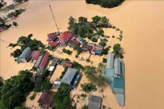 Сильно затопленный жилой район в общине Йенбинь, провинция Лангшон (Фото: ВИA)