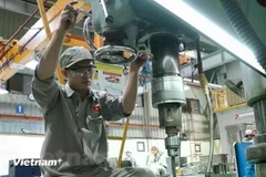 Промышленное производство вносит положительный вклад в экономический рост. (Фото: VietnamPlus)
