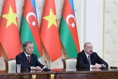 Генеральный секретарь ЦК Коммунистической партии Вьетнама То Лам (слева) и президент Азербайджана Ильхам Алиев на пресс-конференции. (Фото: ВИA)