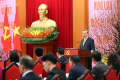 Генеральный секретарь ЦК КПВ То Лам выступает на встрече с выдающимися вьетнамцами, проживающими за рубежом. (Фото: ВИА) 