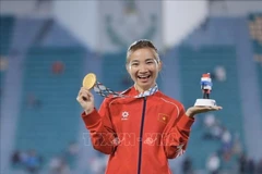 Хоанг Тхи Оань завоёвывает своё третье золото на SEA Games 33 и 15-ю золотую медаль Игр Юго-Восточной Азии в карьере. (Фото: ВИА) 