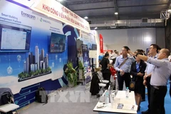 Посетители Международной выставки технологий 2025 (iTech Expo 2025) в городе Хошимин (Фото: ВИA)