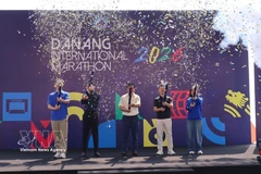 Делегаты выполняют церемонию открытия соревнования. (Фото: ВИА)