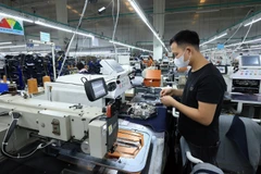 Предприятие по производству комплектующих для швейной продукции в промышленной зоне Камкхе, провинция Футхо. (Фото: ВИА)