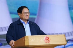 Премьер-министр Фам Минь Тьинь, руководитель Руководящего комитета по строительству АЭС, председательствует на третьем заседании Комитета. (Фото: ВИА).