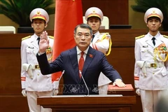 Премьер-министр Правительства Ле Минь Хынг приносит присягу при вступлении в должность. (Фото: ВИА)