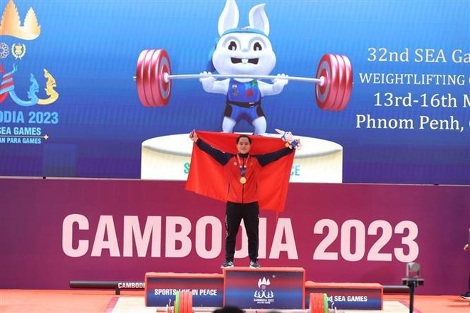 SEA Games 32: Вьетнамская спортивная делегация плказывает роль посланника мира ảnh 1