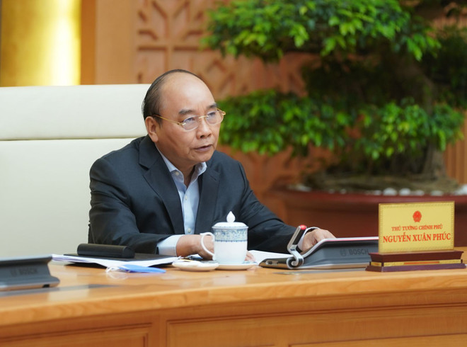 Всевьетнамская видеоконференция по обсуждению решений проблем, связанных с COVID-19 ảnh 1 Всевьетнамская видеоконференция по обсуждению решений проблем, связанных с COVID-19 ảnh 1