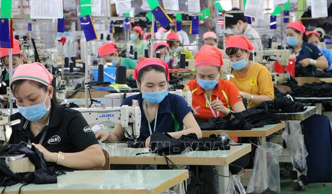 Вьетнамский текстиль и обувь привлекают внимание американских потребителей ảnh 1