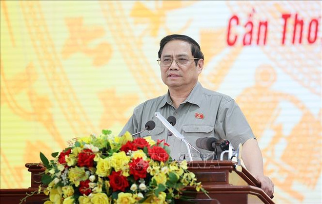 Премьер-министр Фам Минь Тьинь: Устранить узкие места, ускорить проекты строительства автомагистралей и проекты ОПР в дельте Меконга ảnh 1