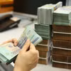 За семь месяцев поступления в государственный бюджет от экспортно-импортной деятельности увеличились почти на 19%. Фото: Vietnam+.