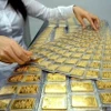Государственный банк Вьетнама будет координировать действия с Министерством общественной безопасности по управлению рынком золота. (Фото: ВИА)