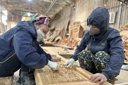 На деревообрабатывающем предприятии в бывшей провинции Виньфук (ныне Футхо). (Фото: ВИА) 