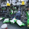 Упаковка риса для экспорта на заводе компании Vinh Phat Wilmar LLC, квартал Биньдык, провинция Анзянг (Фото: ВИА)