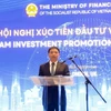 Министр Нгуен Ван Тханг выступает на конференции