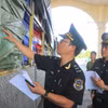 Проверка товаров в Международном пограничном пункте пропуска Тиньбьен провинции Анзянг (Фото: ВИА)