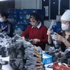 Текстильная и обувная продукция всё ещё обладает большим потенциалом на внутреннем рынке Вьетнама (Фото: ВИА)