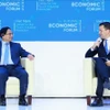 Премьер-министр Фам Минь Тьинь провёл диалог с Стефаном Мергенталером, исполнительным директором ВЭФ, на тему «Двойная трансформация: от стратегии к действиям — формирование Вьетнама в эпоху подъема» (Фото: ВИА)