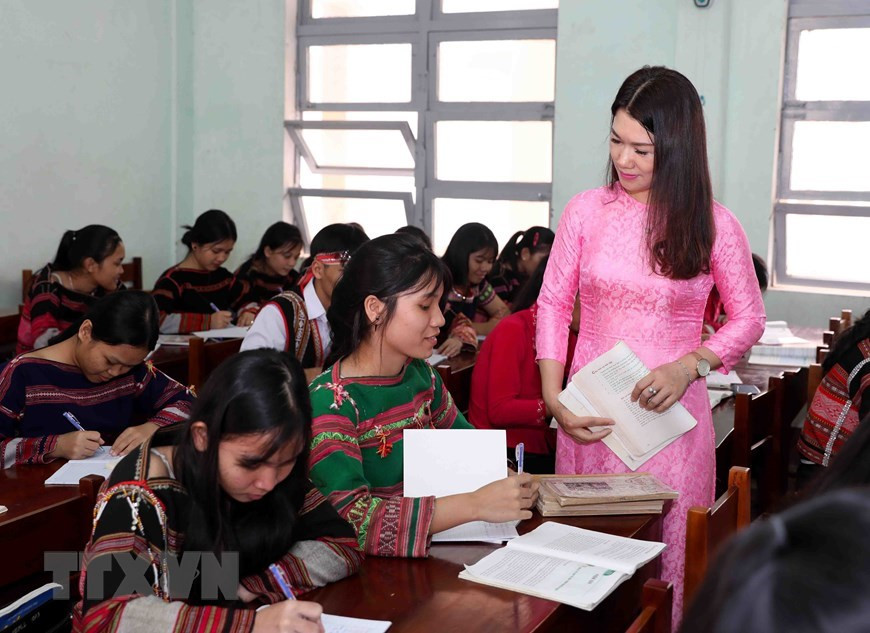 Образ учителей, одетых в Аозай, помог познакомить международных друзей с традиционной вьетнамской одеждой аозай (Фото: ВИА)