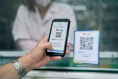 За последние 9 месяцев на внутреннем рынке объём платежей через QR-код резко вырос на 150%. (Фото: Vietnam+)