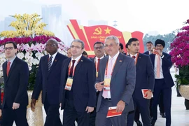 Иностранные делегаты прибыли для участия в заседании открытия XIV всевьетнамского съезда Коммунистической партии Вьетнама. Фото: ВИА.