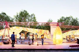 Уникальная выставка, выполненная из традиционной бумаги зо и переработанных материалов, в саду Диенхонг. Фото: nhandan.vn