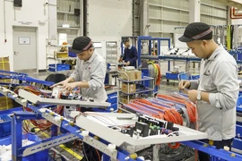 Эксперты отметили, что перспективы экономики Вьетнама по-прежнему опираются на стабильный приток прямых иностранных инвестиций и государственных инвестиций, которые играют важную роль в стимулировании экономического роста. Фото: thoibaotaichinh.vn.