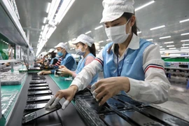 Линия сборки электронных компонентов на предприятии Sun Tech. Фото: ВИА.