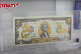 Памятная банкнота США номиналом 2 доллара с позолотой. Фото: ВИА.