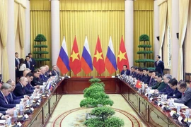 Президент Вьетнама То Лам (ныне — Генеральный секретарь ЦК КПВ То Лам) провёл переговоры с Президентом Российской Федерации Владимиром Путиным, прибывшим с государственным визитом во Вьетнам днём 20 июня 2024 года в Дворце Президента. Фото: ВИА.