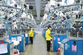 Текущая производственная деятельность компании Bangjie Vietnam Co., Ltd. на текстильно-трикотажном промышленном парке Фоной, провинция Хынгйен. Фото: nhandan.vn.
