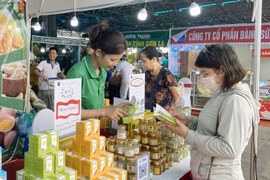  Покупатели на рынке MM Mega Market (Фото: hanoimoi.vn)