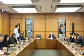 Национальное собрание проводит групповые обсуждения во время внеочередной сессии 14 февраля. (Фото: ВИA)