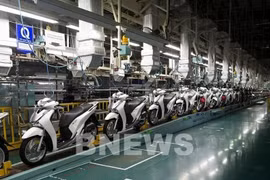 Линия по производству мотоциклов японской компании Honda Vietnam, расположенной в провинции Футхо. (Фото: ВИA)