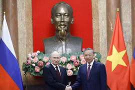  Президент Вьетнама То Лам и Президент Российской Федерации Владимир Путин в Ханое, 20 июня 2024 года. (Фото: ВИА)