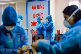 Вьетнамская ассоциация фотохудожников (VAPA) открыла онлайн-выставку «Nhung khoanh khac tu trai tim» («Душевные моменты»), чтобы представить фотографии, посвященные мероприятиям по профилактике и борьбе с COVID-19. (Фото: ВИА)