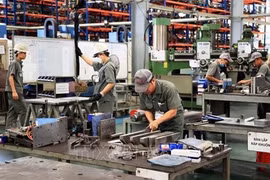 Рабочие на заводе Global Powersports Manufacturing Inc. в уезде Чангбом, провинция Донгнай (Фото: ВИA)