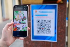 QR-коды для предвыборной агитации и для медицинской декларации будут распространены во всех организациях - членах Союза в Ханое во время выборов. (Фото: Vietnam+)