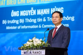 Министр Нгуен Ман Хунг выступает на конференции. (Фото: Минь Шон / Vietnam+)