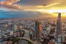 Standard Chartered Bank сохраняет устойчивый прогноз роста ВВП на 2024 год на уровне 6,7%. (Фото: baodutu.vn)